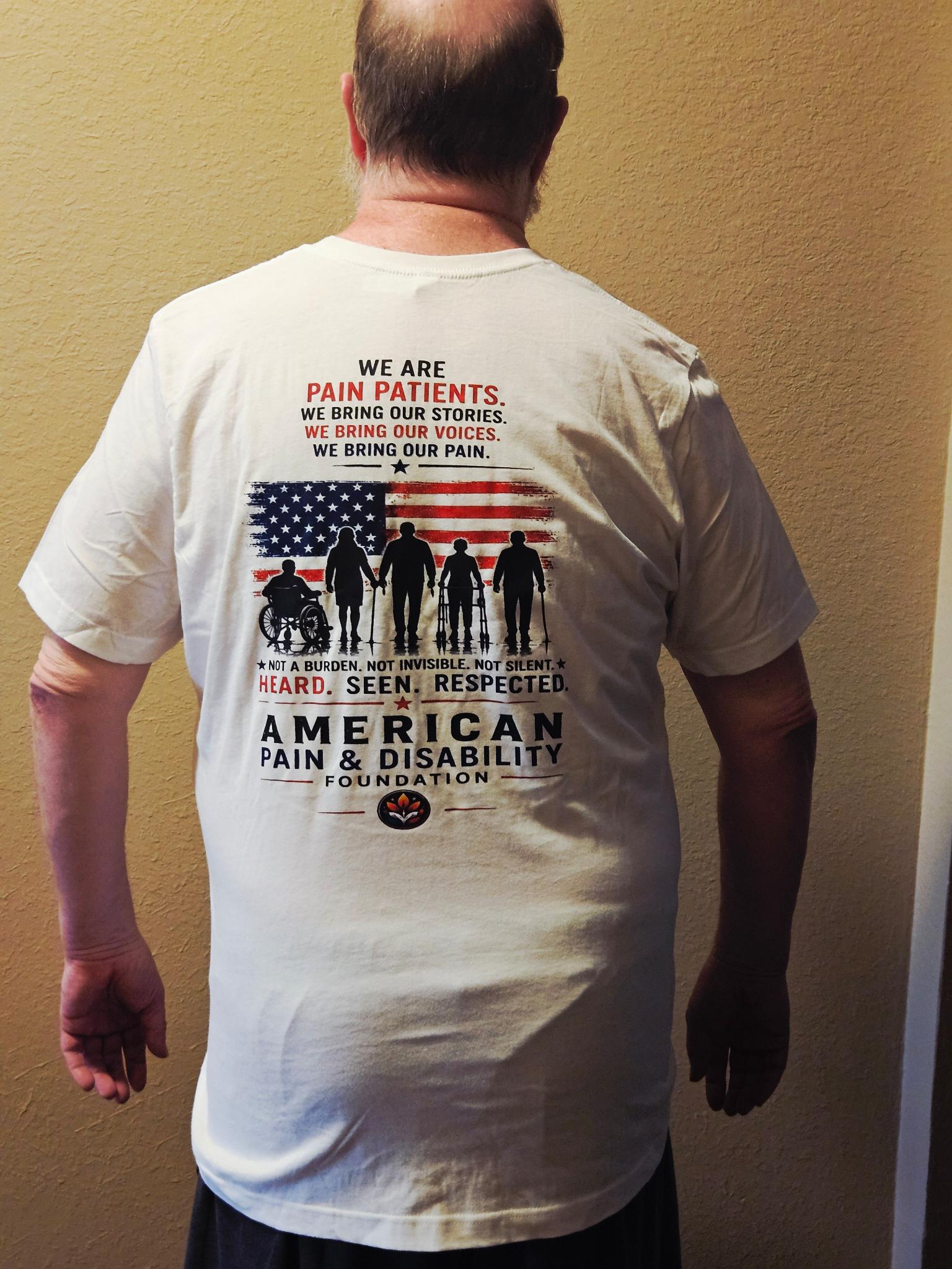 Back of Bring Pain to D.C. advocacy shirt
